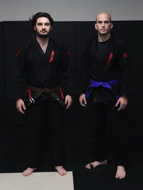 Two Meta Jiu Jitsu Academy athletes wearing black gis