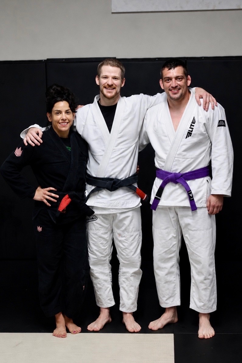 Professor Yvette Wong, Professor Justin Hale, and Coach Shane Butters together at Meta Jiu Jitsu Academy